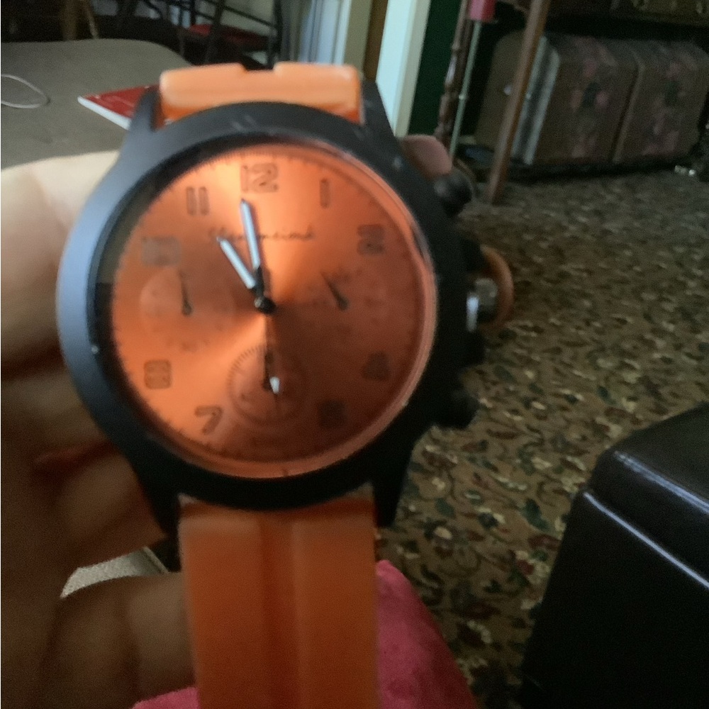 Orange silicone watch…
